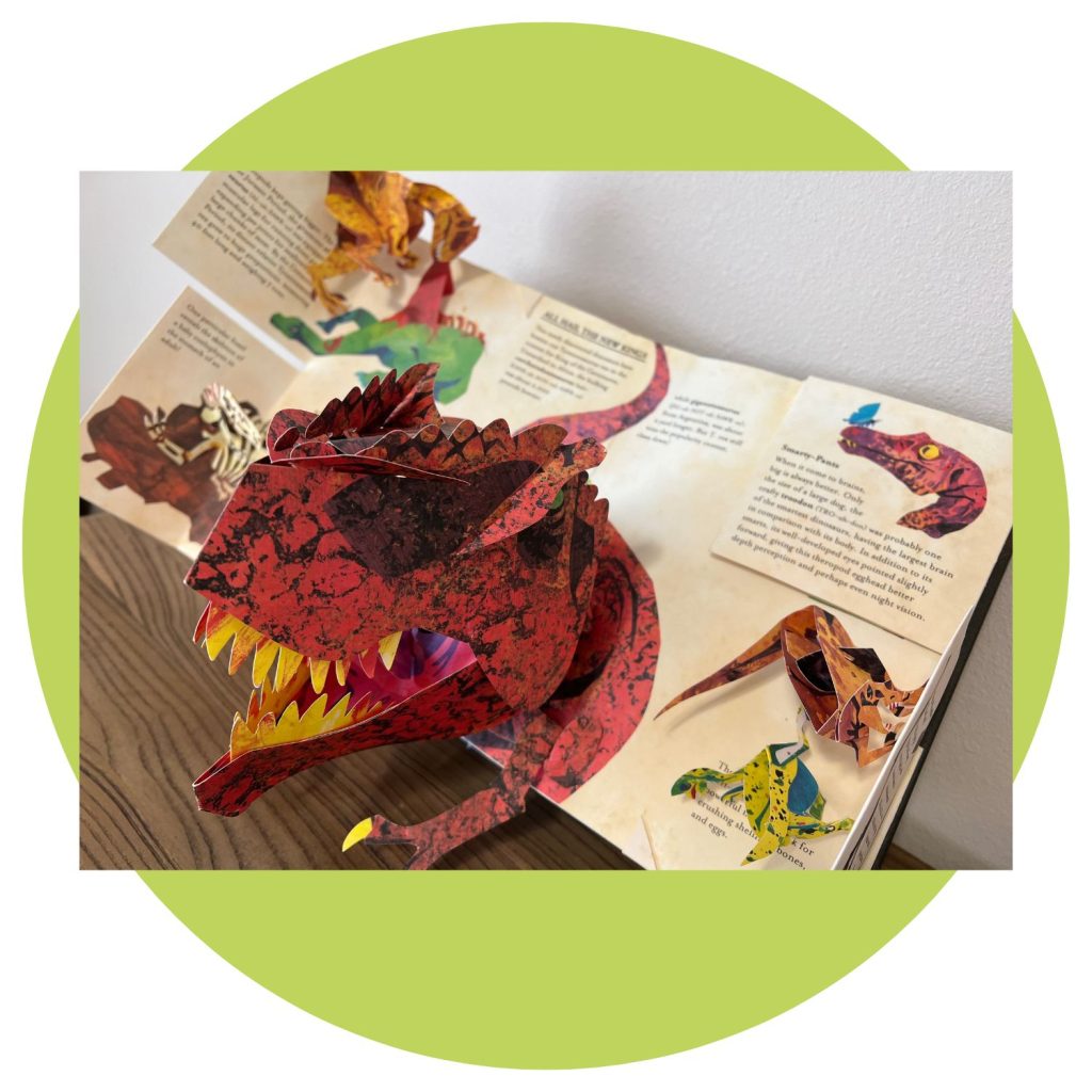Inside pages from Robert Sabuda's dinosaur pop-up book.